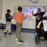 Jennifer Landry-Reid leads a scheduled movement break to help her students regulate and transition after recess at West Bedford School.