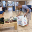 A staff member unloads food donations at BFEC.