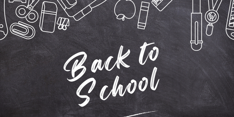 "Back to school" written on a chalk board